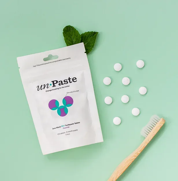 Category reference: Unpaste tooth tabs in soft green packaging