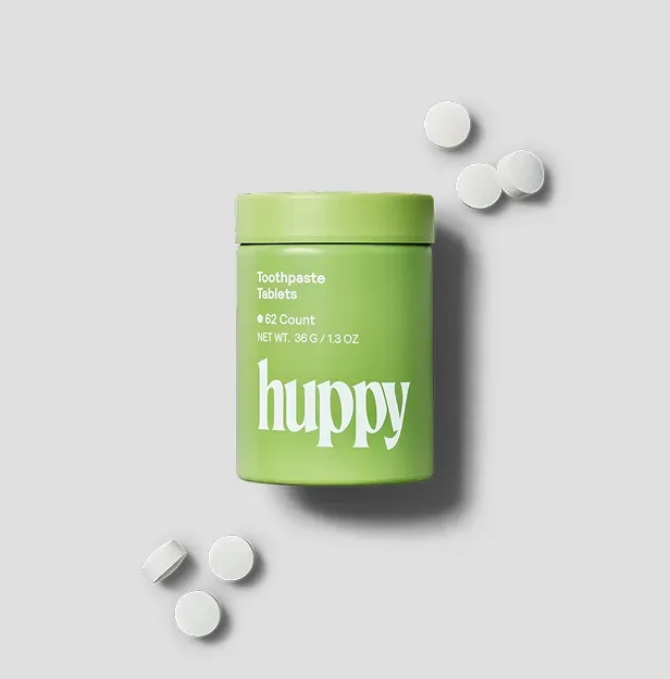 Category reference: Huppy toothpaste tablets in a green tin
