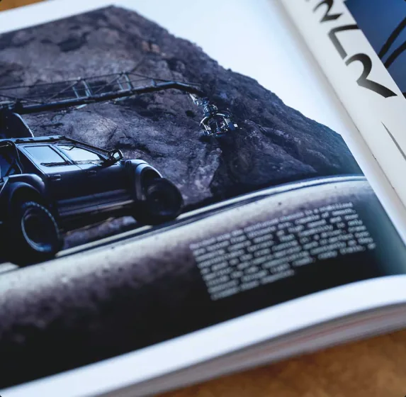 Close-up of Dusty Times printed editorial photography and text